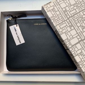 Comme Des Garçons Pouch